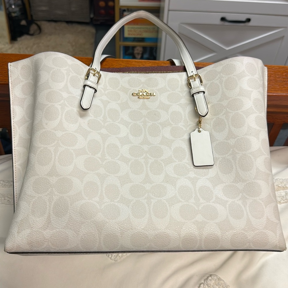 White coach bag (some stain on back)